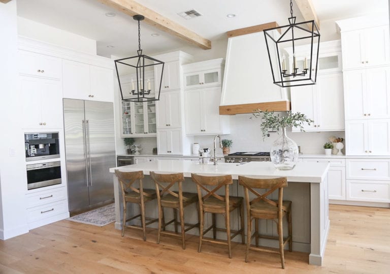 Steiner Transitional White Kitchen With Wood Trimmed Hood - UB Kitchens ...